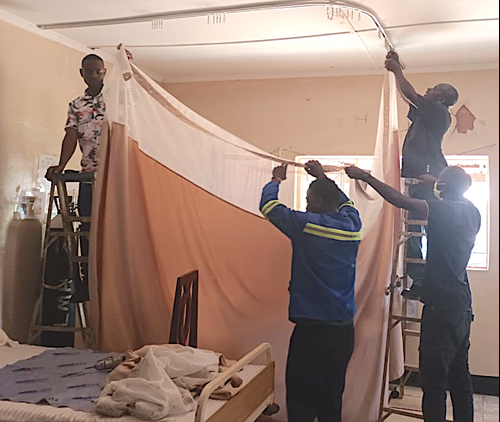 installing tracks and privacy curtains