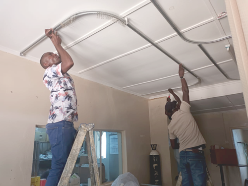 installing tracks and privacy curtains